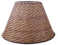 Empire bell shaped woven basket brown straw lampshade on a white background isolated close up shot Royalty Free Stock Photo