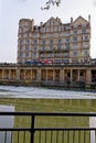 Empire Hotel and The Colonnade on river Avon in Bath, Somerset, England