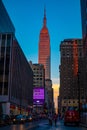 Empire State Building in `color`, at sunset