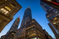 The Empire State Building illuminated with Christmas lights at twilight. Skyscrapers on 5th Avenue, Midtown Manhattan, New York