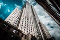 Empire state building, low angle with dramatic clouds