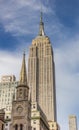 Empire State Building and Marble Collegiate Church in New York C Royalty Free Stock Photo