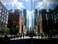 Empire State Building and reflection from West 33rd Street, in Midtown Manhattan, New York City