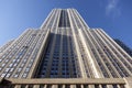 Empire state building seen from 34th street and blue sky