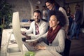 Employed woman at computer in office Royalty Free Stock Photo