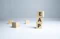 Employee assistance program EAP sign on wooden cubes