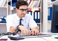 Employee attached and chained to his desk with chain Royalty Free Stock Photo