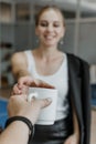 Employee care, caring in the workplace, Engagement and Retention. Young business woman drinking coffee in office break Royalty Free Stock Photo