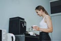 Employee care, caring in the workplace, Engagement and Retention. Young business woman drinking coffee in office break Royalty Free Stock Photo