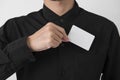 Employee catch blank business card in pocket for mockup template