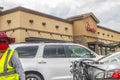 Employee at Chick fil A wearing a red face mask during the covid-19 pandemic