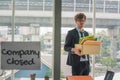 Employee with company closed annoucement lose job during lockdown Royalty Free Stock Photo