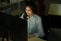 Customer service working as technical support call center in the office with headphone computer overtime Royalty Free Stock Photo