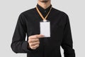 Employee hand showing blank id card badge holder for mockup