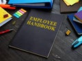 Employee handbook and papers with rules and procedures