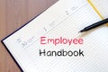 Employee handbook text concept on notebook Royalty Free Stock Photo