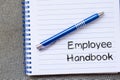 Employee handbook text concept on notebook Royalty Free Stock Photo