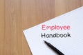 Employee handbook text concept on notebook Royalty Free Stock Photo