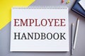 Employee Handbook text written in Notepad.Business photo text Document Manual Regulations Rules Guidebook Policy Code