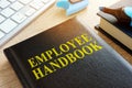 Employee handbook on a desk. Royalty Free Stock Photo