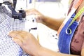 Employee at industrial sewing machine Royalty Free Stock Photo