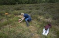 An employee of the Irish IPCC is mapping a piece of bogland. Royalty Free Stock Photo
