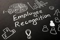 Employee recognition inscription on the sheet Royalty Free Stock Photo