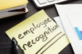 Employee recognition written on a memo stick. Royalty Free Stock Photo
