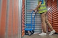 Employee in a reflective vest working in the storehouse