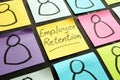 Employee retention sign and figures on the memo sticks Royalty Free Stock Photo