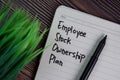 Employee Stock Ownership Plan write on a book isolated wooden table Royalty Free Stock Photo