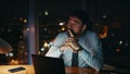 Employee tired night work sitting office desk with laptop closeup. Busy manager Royalty Free Stock Photo