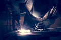 Employee welding aluminum using TIG Royalty Free Stock Photo