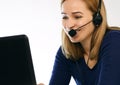 Employee working in a call center. Headset telemarketing woman talking on helpline Royalty Free Stock Photo