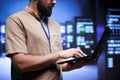 Employee working on server systems