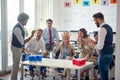 Employees at a break in the office playing some games. Employees, job, office Royalty Free Stock Photo