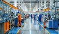 Employees are busy working in the factory with machinery, creating a hub of activity Royalty Free Stock Photo