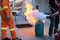 Employees firefighting training,Extinguish a fire Royalty Free Stock Photo