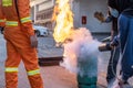 Employees firefighting training,Extinguish a fire Royalty Free Stock Photo