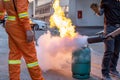 Employees firefighting training,Extinguish a fire Royalty Free Stock Photo