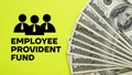 Employees provident fund EPF is shown using the text and photo of dollars Royalty Free Stock Photo