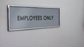 Employees only room door, entrance restriction, prohibited area, workplace