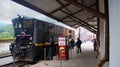 Employees of the tourist railway working at the Alausi train station