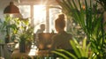 1. Employees working in a bright, eco-friendly office with plants and natural light