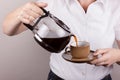 Employing coffee in a cup Royalty Free Stock Photo