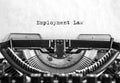 Employment Law word typed words on a vintage typewriter. Close up Royalty Free Stock Photo