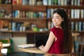 Employment In Remote. Asian Girl Using Laptop With Black Screen In Cafe Royalty Free Stock Photo