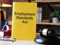 Employment standards act is shown on the conceptual photo