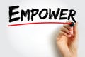 Empower - to give power or authority to, authorize, especially by legal or official means, text concept background Royalty Free Stock Photo