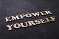 Empower yourself, business motivational inspirational quotes, wooden words typography lettering concept Royalty Free Stock Photo